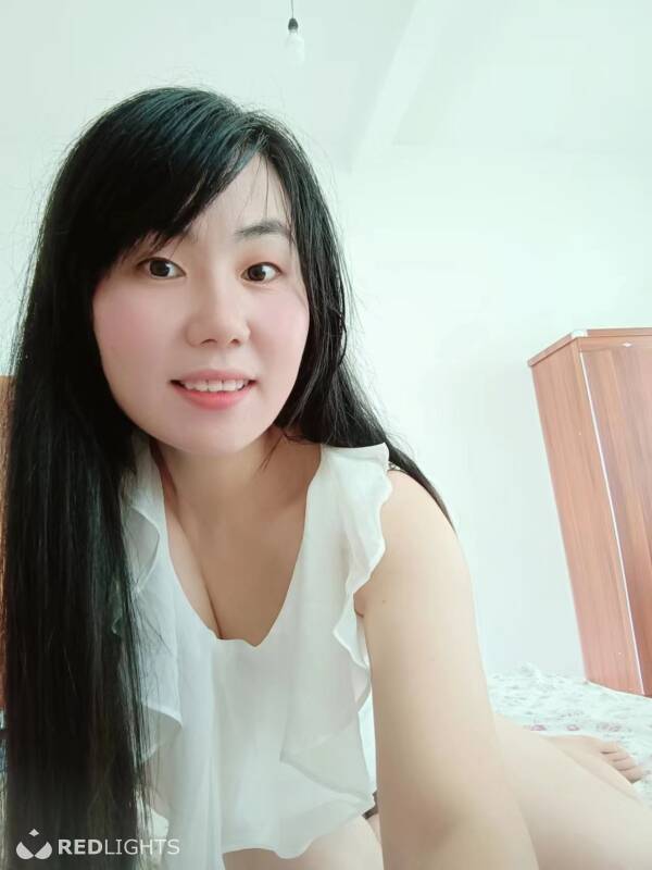 Xiuhua (Foto)